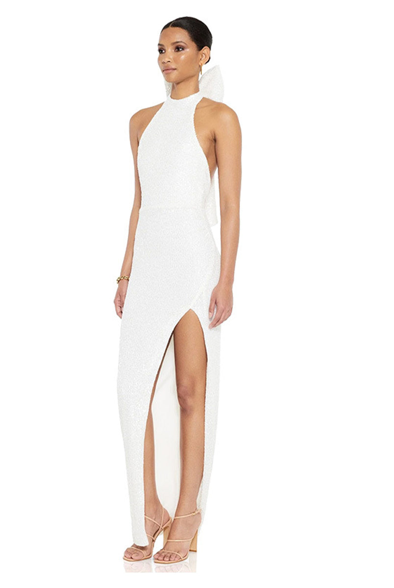 Backless sequin party dress, halter neck with statement bow detail