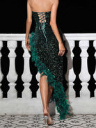 Glamorous Backless Sequin Gown with Feather Trim